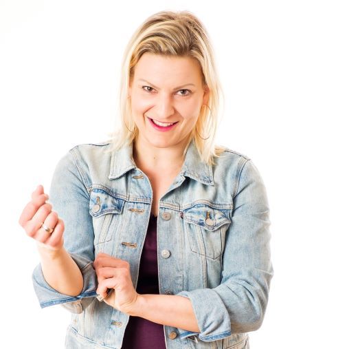 Stand up koomikko luennoitsija puhuja